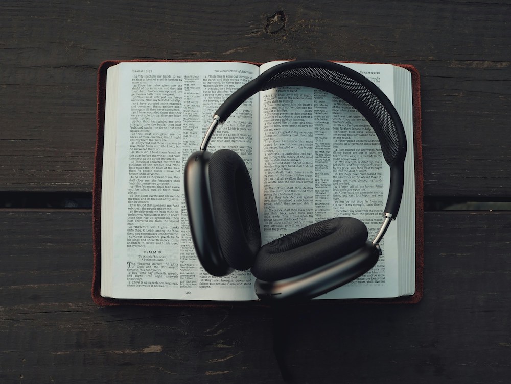 Open book with headphones